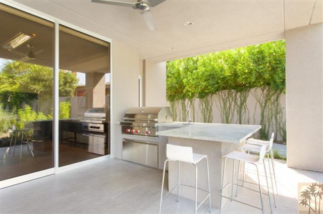 71172 La Paz Road Rancho Mirage, CA 92270 - Photo 33 of 51 a kitchen with a table and chairs