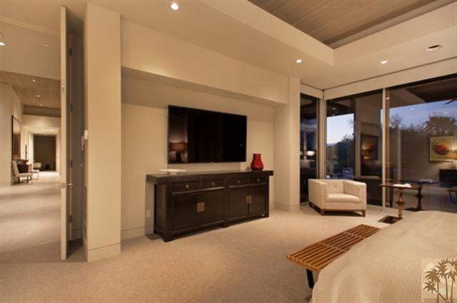 71172 La Paz Road Rancho Mirage, CA 92270 - Photo 47 of 51 a bedroom with a bed and a flat screen television