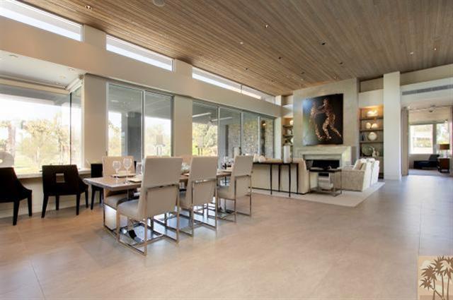71172 La Paz Road Rancho Mirage, CA 92270 - Photo 8 of 51 a living room with lots of furniture and large windows