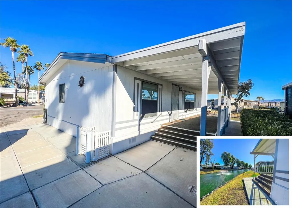 586 Channel, Unit 586 Needles, CA 92363 - Photo 1 of 1 a view of a patio with couches chairs and a potted plant
