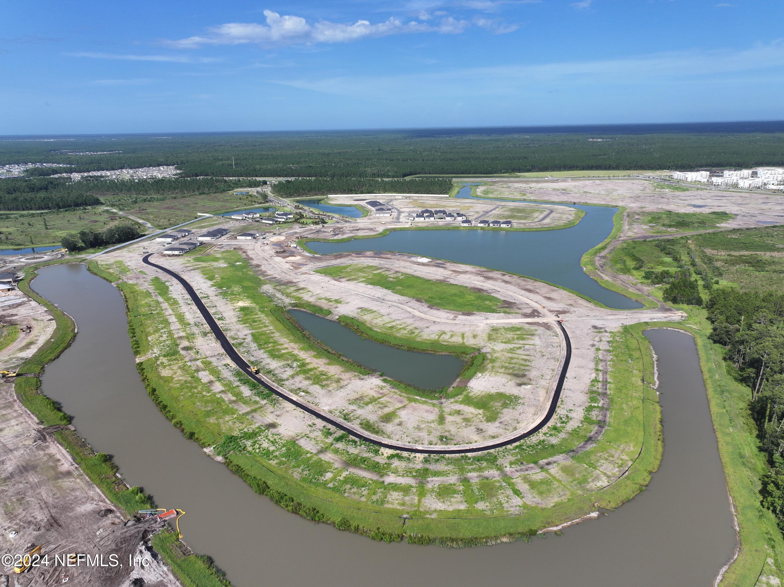 152 Day Dream Drive St. Augustine, FL 32092 - Photo 30 of 34 an aerial view of a swimming pool