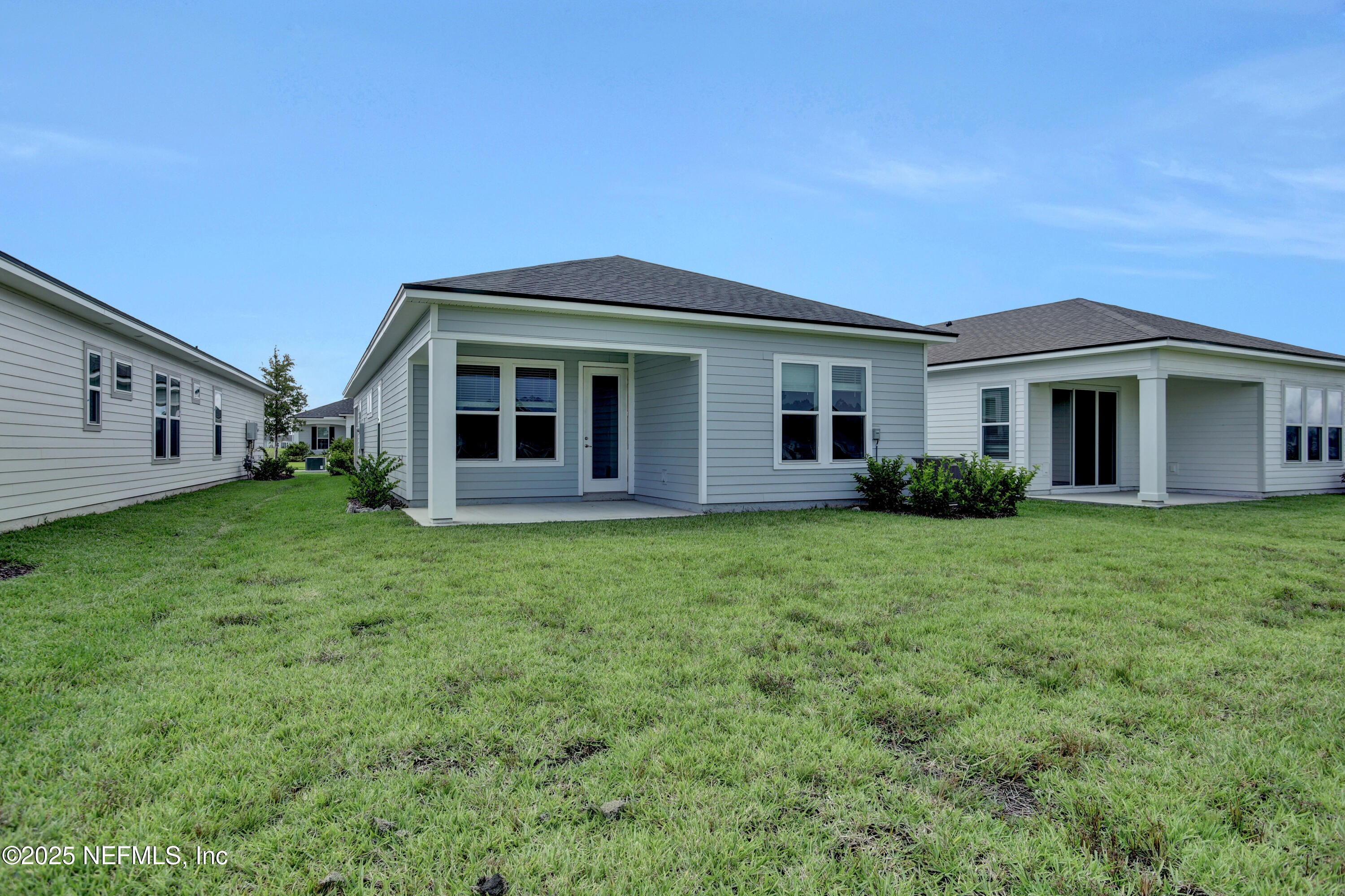 152 Day Dream Drive St. Augustine, FL 32092 - Photo 6 of 34 a view of a house with backyard