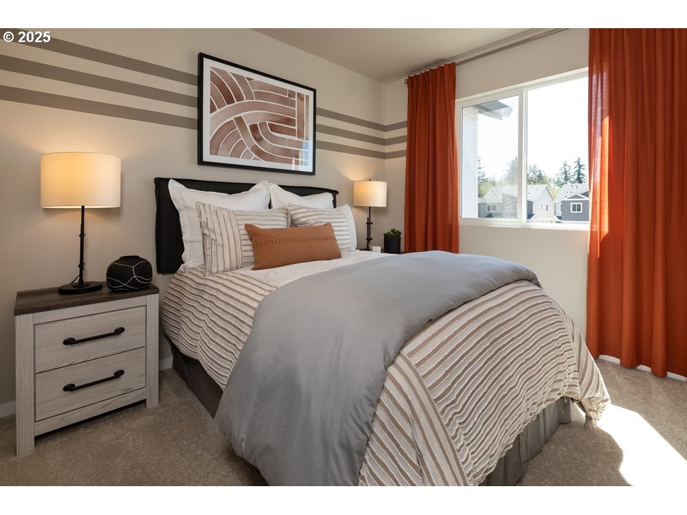 448 Southwest 32nd Street Battle Ground, WA 98604 - Photo 10 of 15 a bedroom with a bed and a window