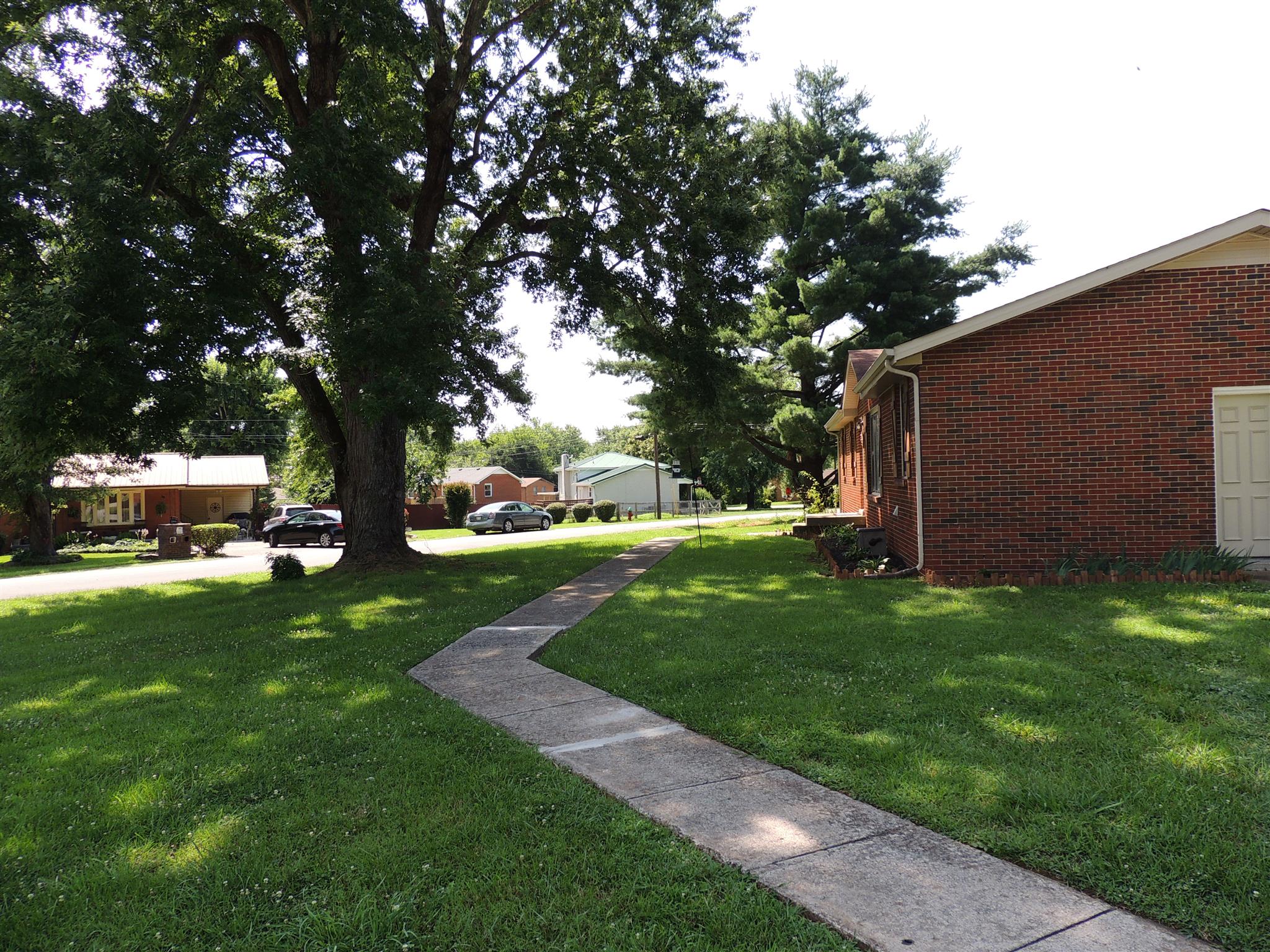 318 Notgrass Road Clarksville, TN 37042 - Photo 7 of 27 a view of a backyard with large trees