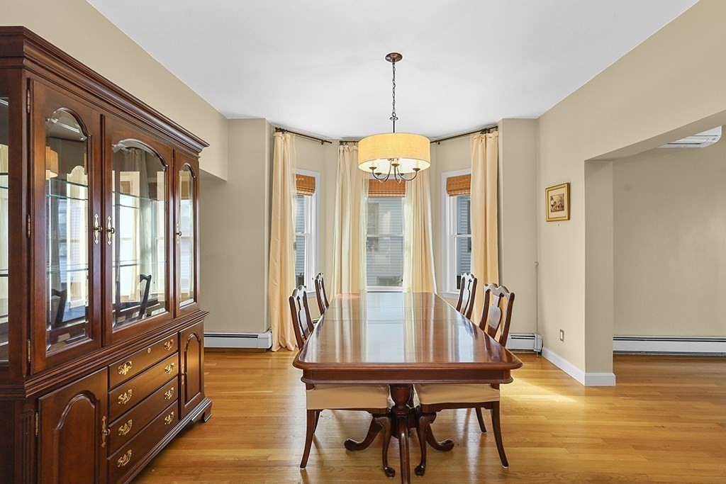 339 Winthrop Street Winthrop, MA 02152 - Photo 11 of 42 a view of a dining room with furniture window and wooden floor