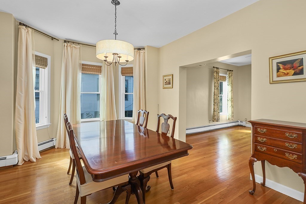 339 Winthrop Street Winthrop, MA 02152 - Photo 13 of 42 a view of a dining room with furniture window and wooden floor