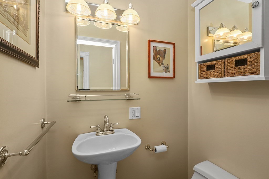 339 Winthrop Street Winthrop, MA 02152 - Photo 18 of 42 a bathroom with a sink and a mirror