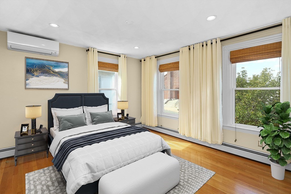 339 Winthrop Street Winthrop, MA 02152 - Photo 20 of 42 a bedroom with a bed and a large window