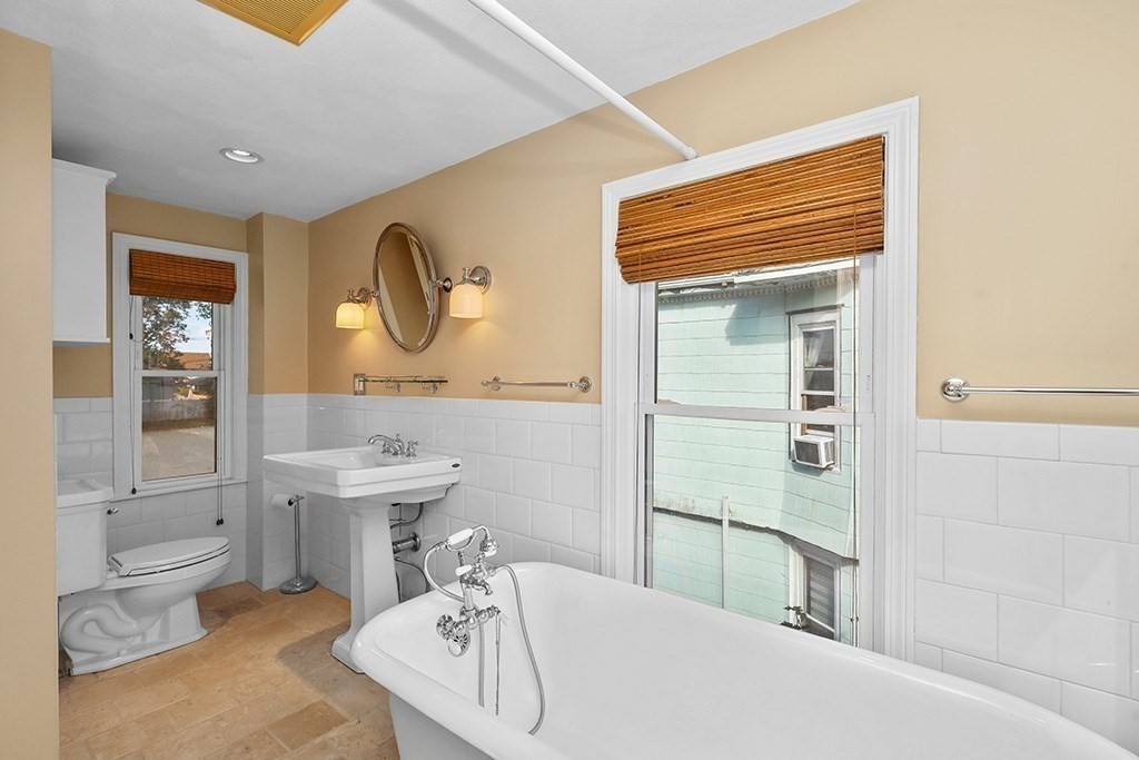 339 Winthrop Street Winthrop, MA 02152 - Photo 23 of 42 a bathroom with a sink a toilet and shower