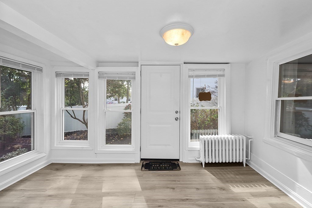 339 Winthrop Street Winthrop, MA 02152 - Photo 28 of 42 a view of a room with wooden floor and windows