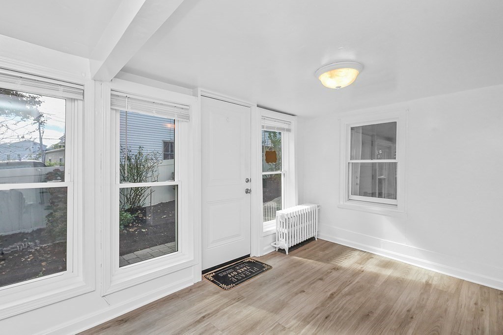 339 Winthrop Street Winthrop, MA 02152 - Photo 29 of 42 a view of wooden floor and windows in a room