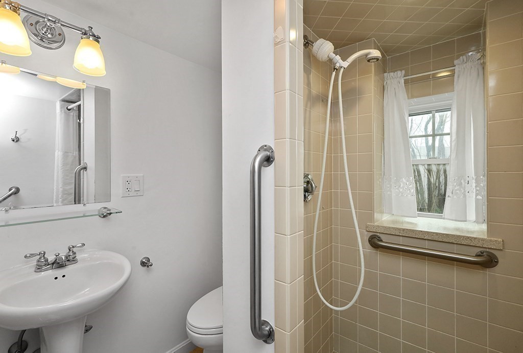339 Winthrop Street Winthrop, MA 02152 - Photo 33 of 42 a bathroom with a shower a toilet and a sink
