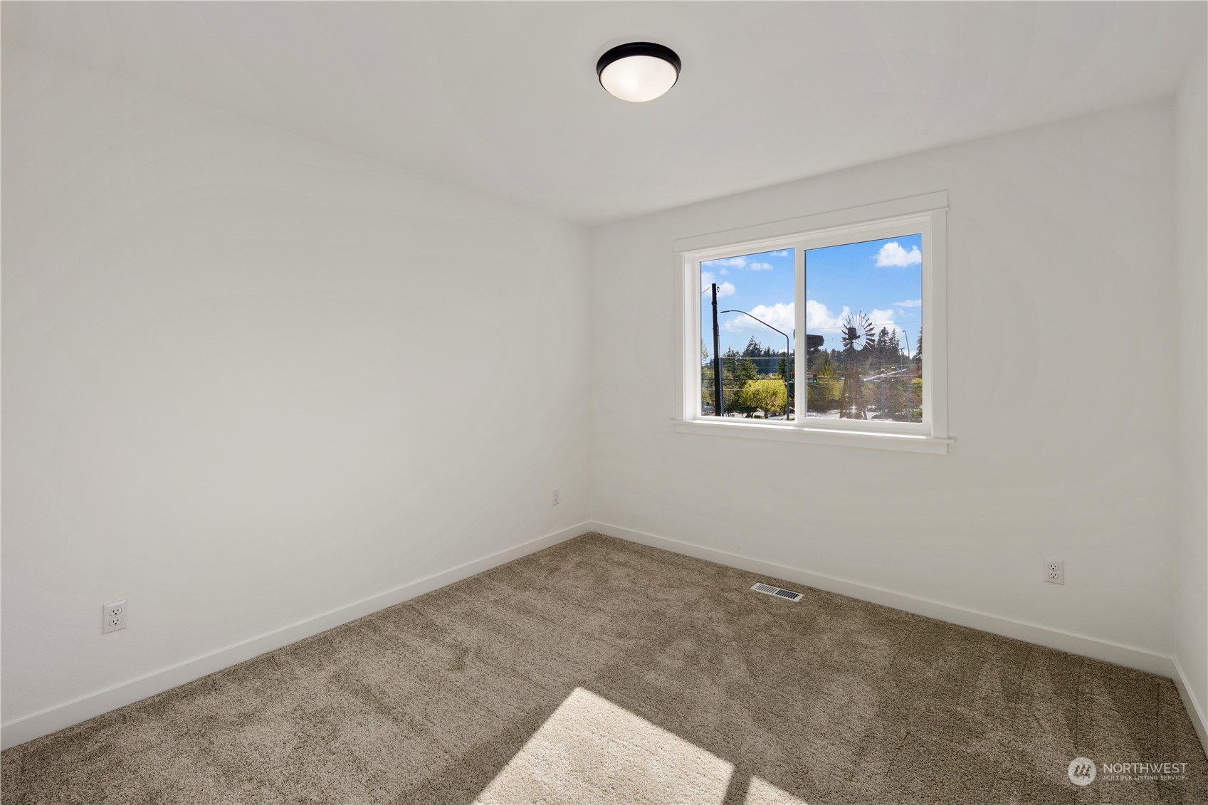 4001 211th Place Southeast Bothell, WA 98021 - Photo 25 of 26 an empty room with windows