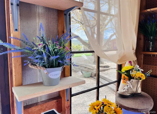 a vase of flowers sitting on a table
