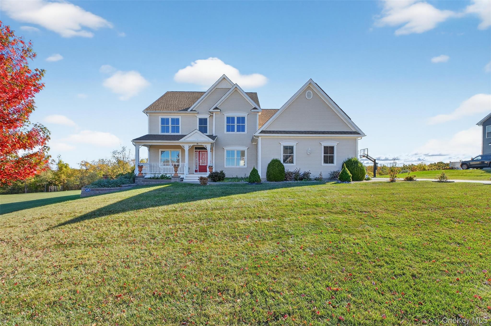 71 Ridgeline Drive Poughkeepsie, NY 12603 - Photo 1 of 1 View of front of house featuring covered porch and a front lawn