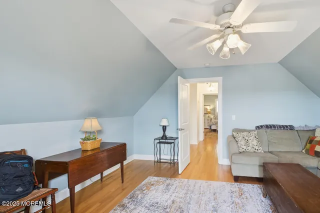 a bathroom with a granite countertop tub sink and a shower