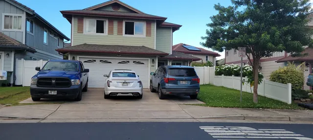 a car parked in front of a house