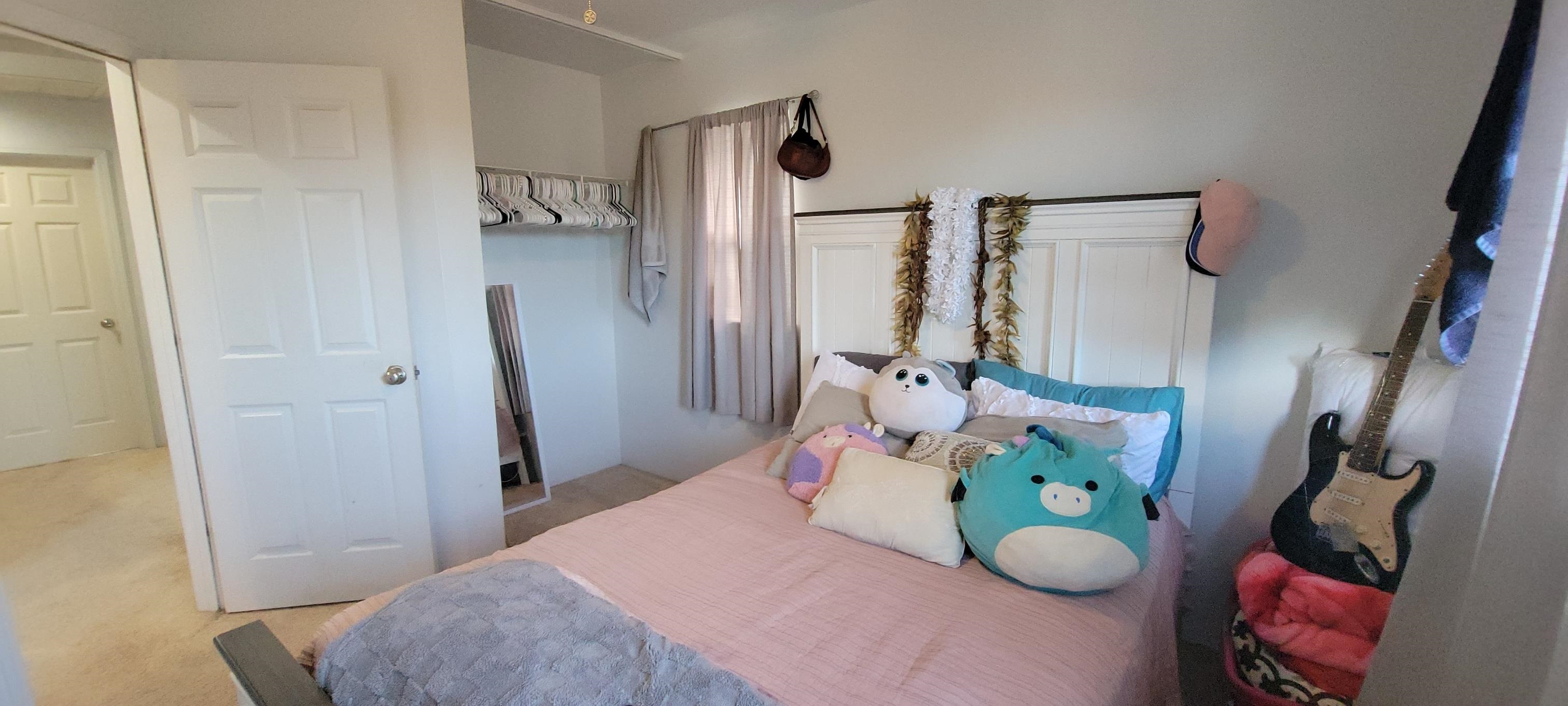 10 West Makahehi Loop Kahului, HI 96732 - Photo 12 of 18 a bedroom with a bed and a window