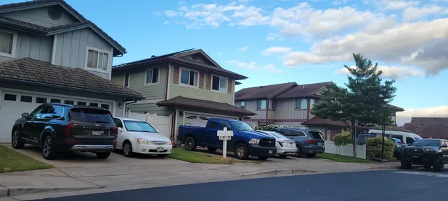 a car parked in front of a house