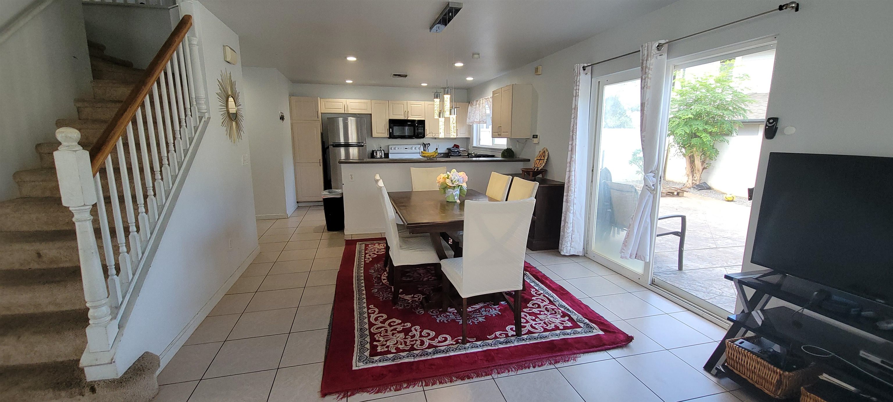10 West Makahehi Loop Kahului, HI 96732 - Photo 3 of 18 a living room with stainless steel appliances furniture stove and a view of kitchen