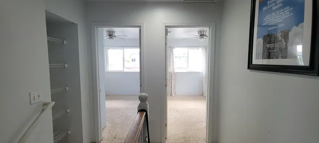 a bathroom that has a window in it