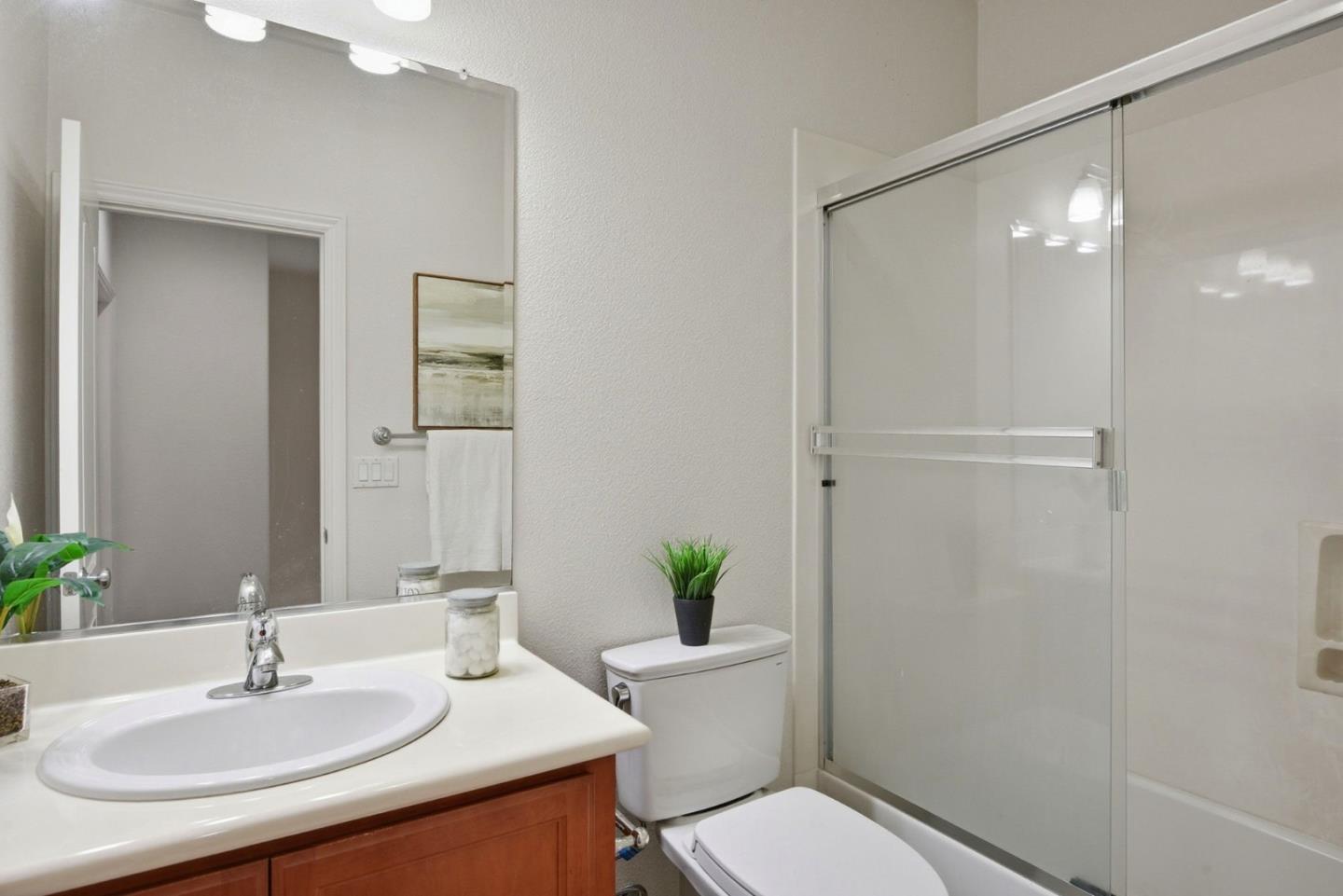 48962 Woodgrove Common Fremont, CA 94539 - Photo 20 of 36 a bathroom with a sink toilet and shower