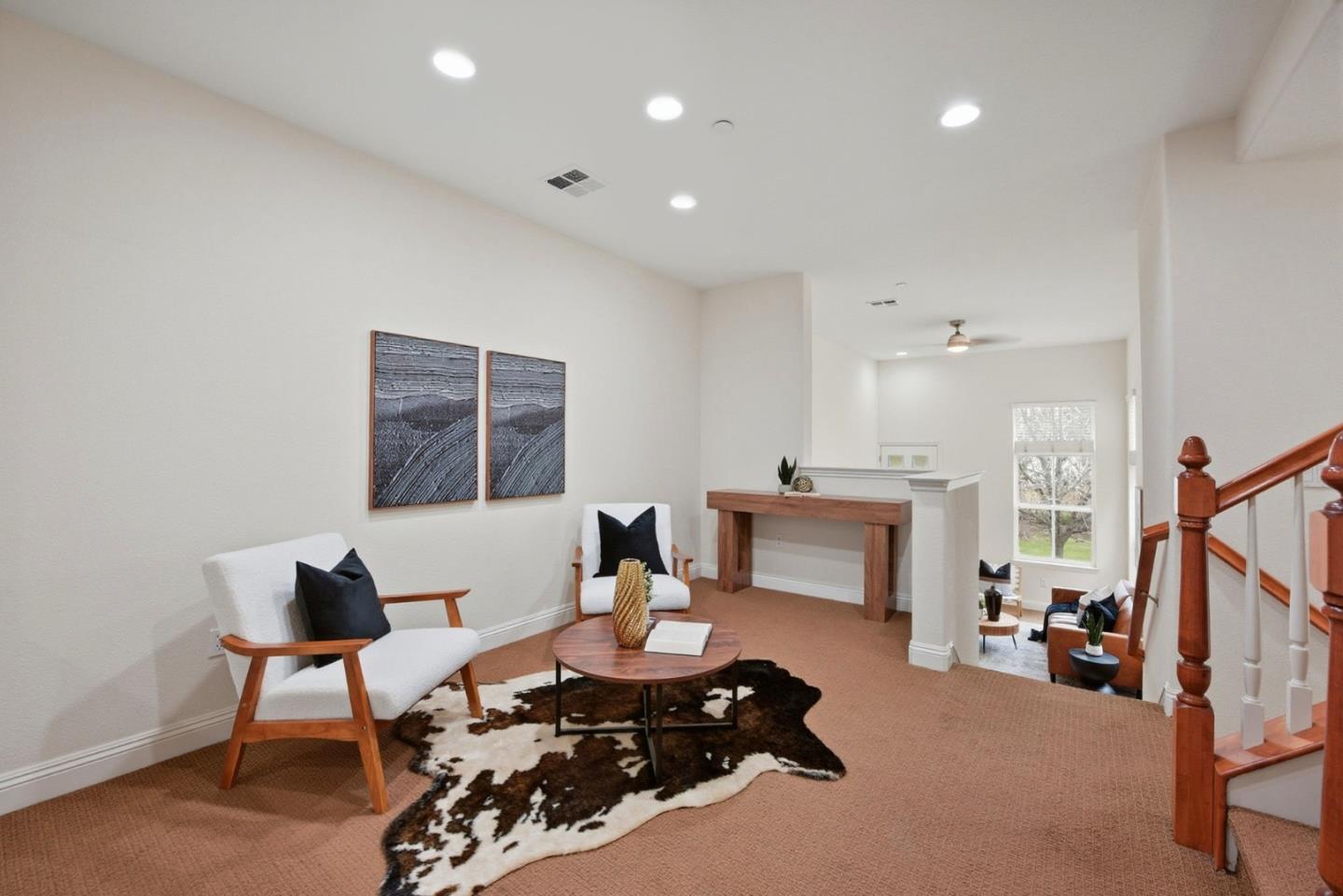48962 Woodgrove Common Fremont, CA 94539 - Photo 3 of 36 a living room with furniture and a fireplace