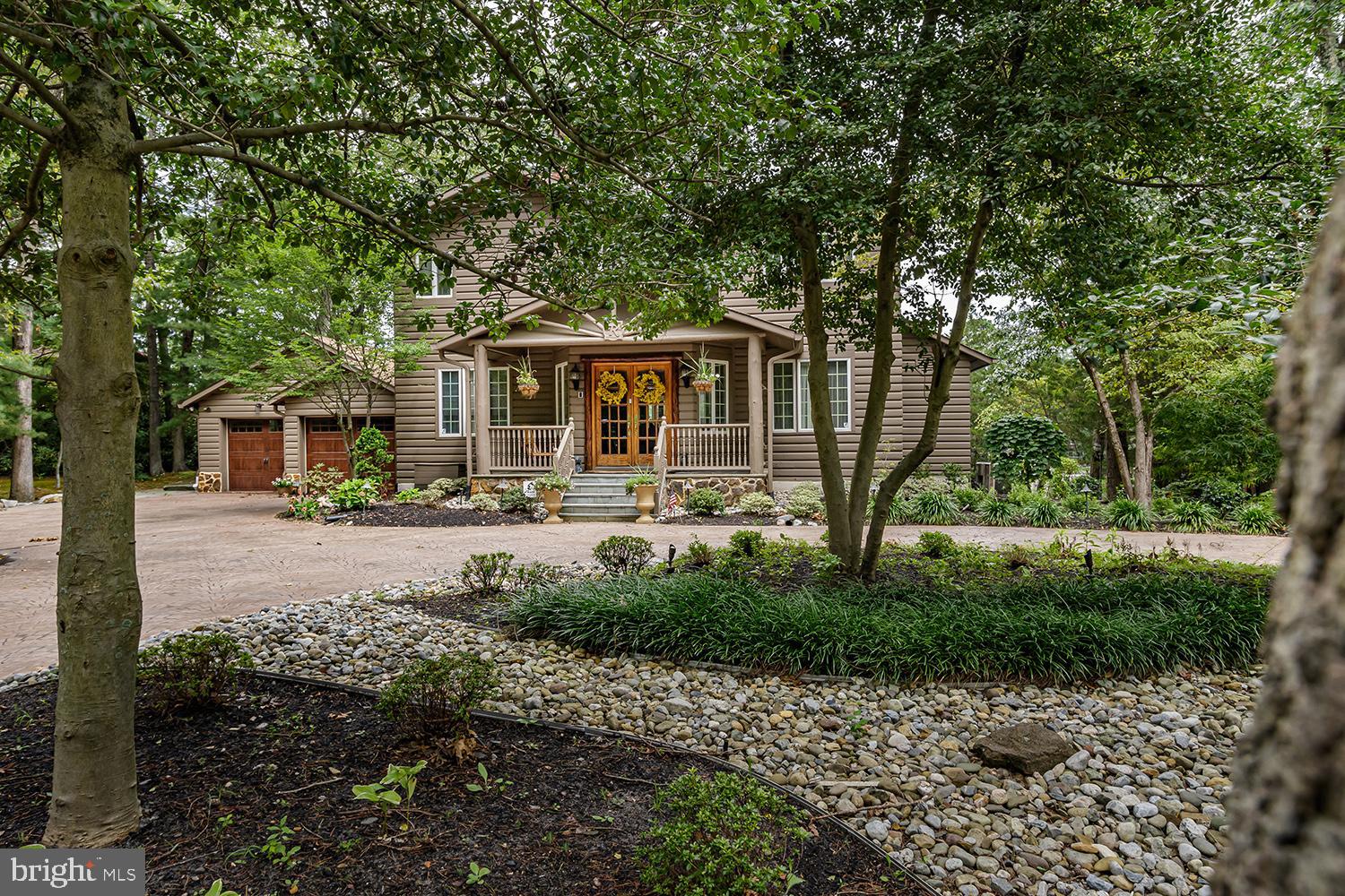 117 Stokes Road Medford Lakes, NJ 08055 - Photo 25 of 72 Front view of home with natural landscaping