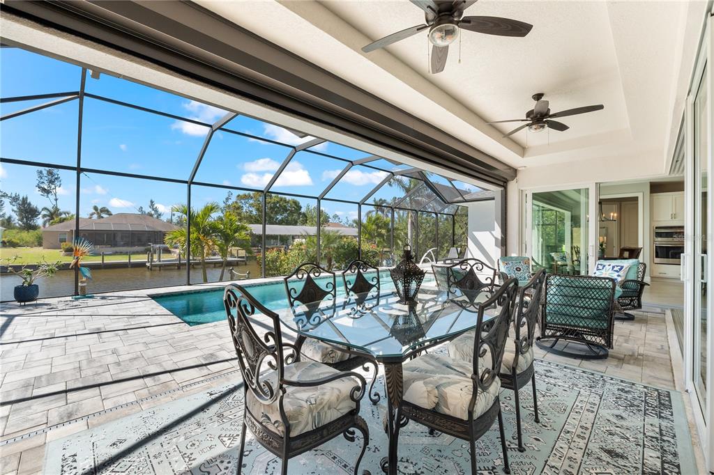 10491 Sarasota Road Port Charlotte, FL 33981 - Photo 28 of 44 a outdoor space with lots of tables and chairs