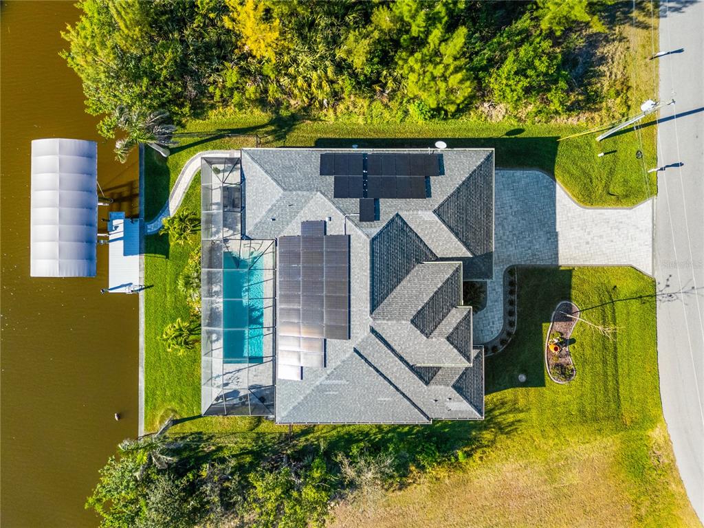 10491 Sarasota Road Port Charlotte, FL 33981 - Photo 42 of 44 an aerial view of a house with swimming pool