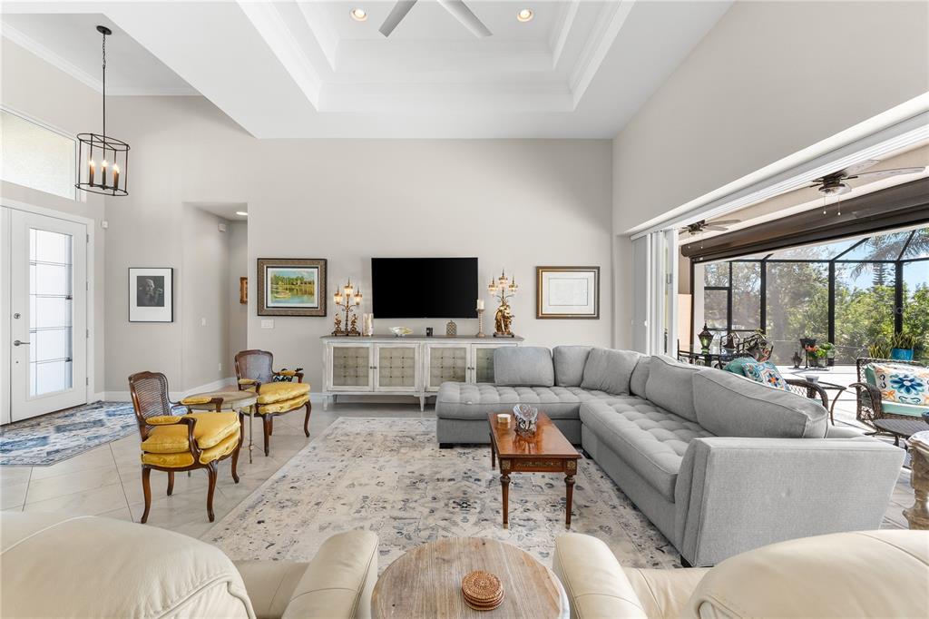 10491 Sarasota Road Port Charlotte, FL 33981 - Photo 5 of 44 a living room with furniture and a flat screen tv