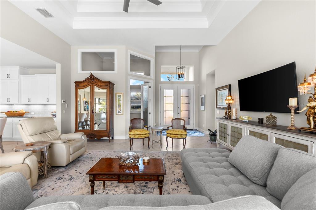 10491 Sarasota Road Port Charlotte, FL 33981 - Photo 6 of 44 a living room with furniture and a flat screen tv