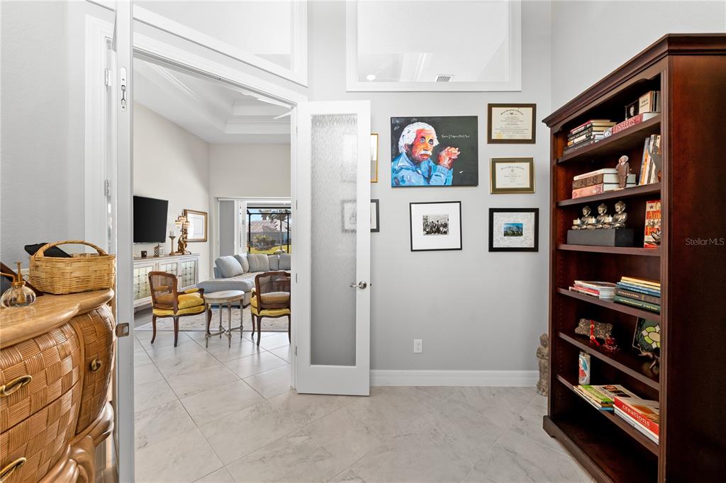 10491 Sarasota Road Port Charlotte, FL 33981 - Photo 8 of 44 a view of a livingroom with workspace and workspace