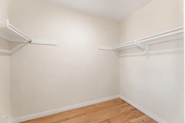 a view of an empty walk in closet