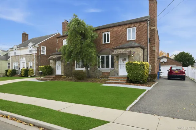 a house view with a garden space