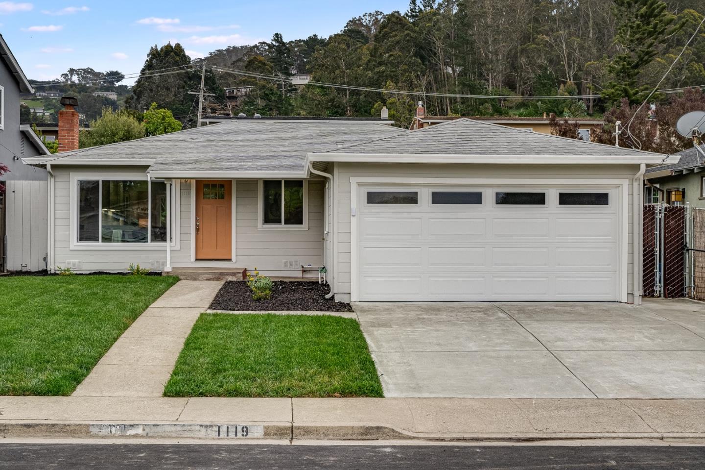 a view of house with yard