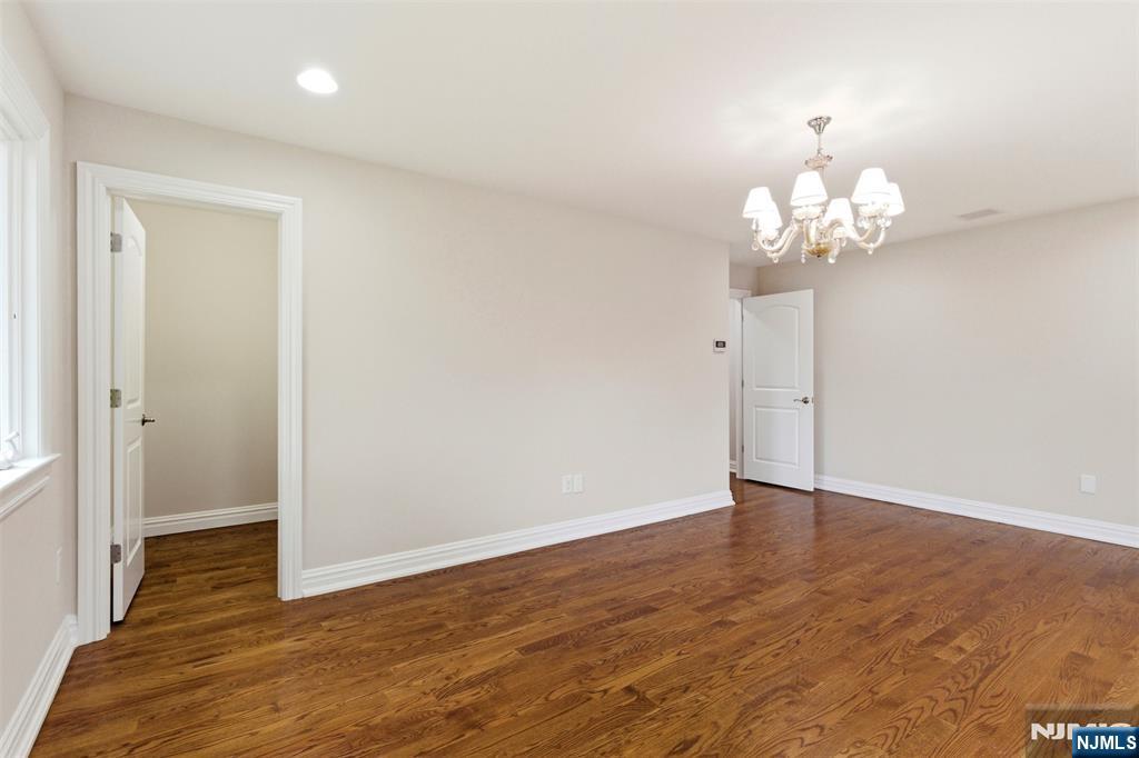 767 Orangeburgh Road River Vale, NJ 07675 - Photo 22 of 49 a view of an empty room with wooden floor