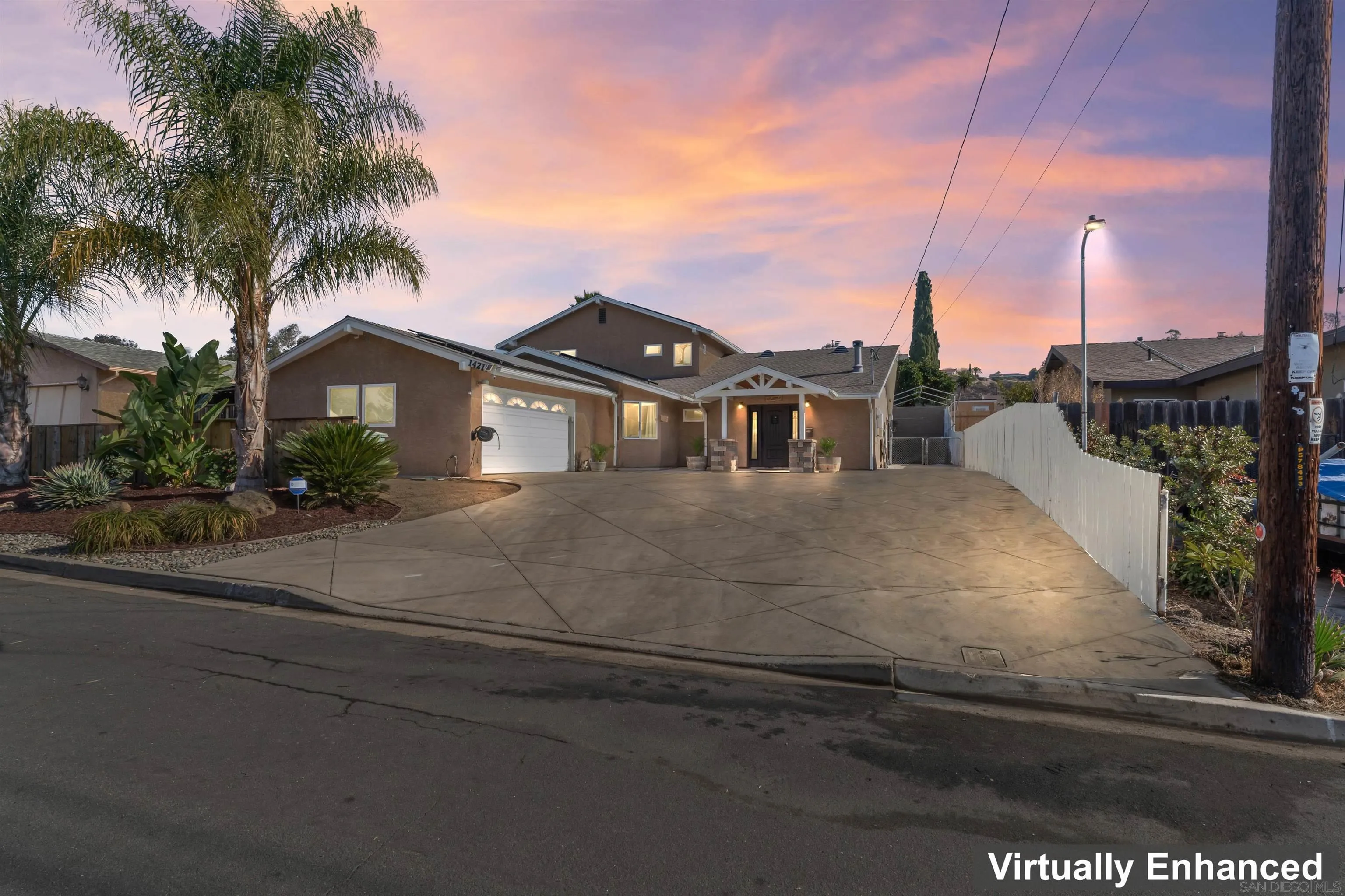 14211 Frame Road Poway, CA 92064 - Photo 1 of 11 a view of a house with a swimming pool