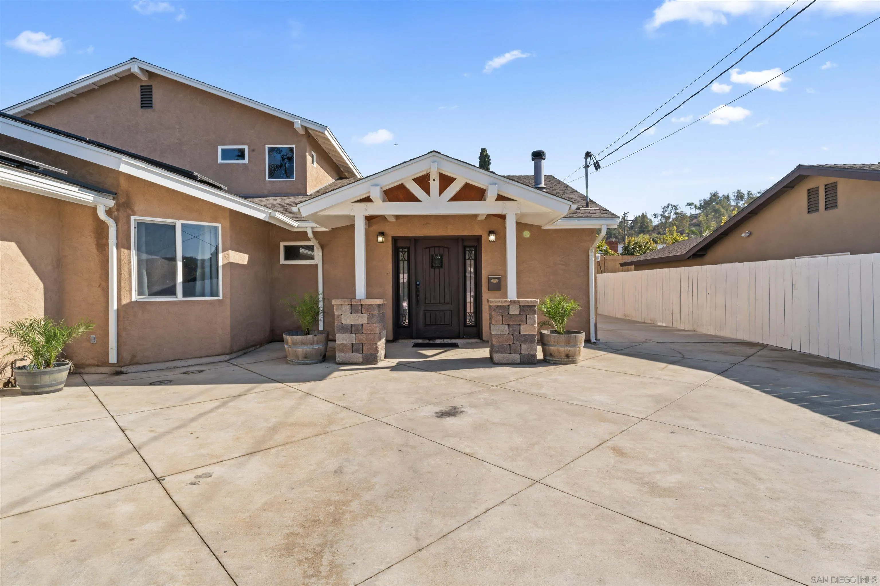 14211 Frame Road Poway, CA 92064 - Photo 6 of 11 a view of a house with a yard and potted plants