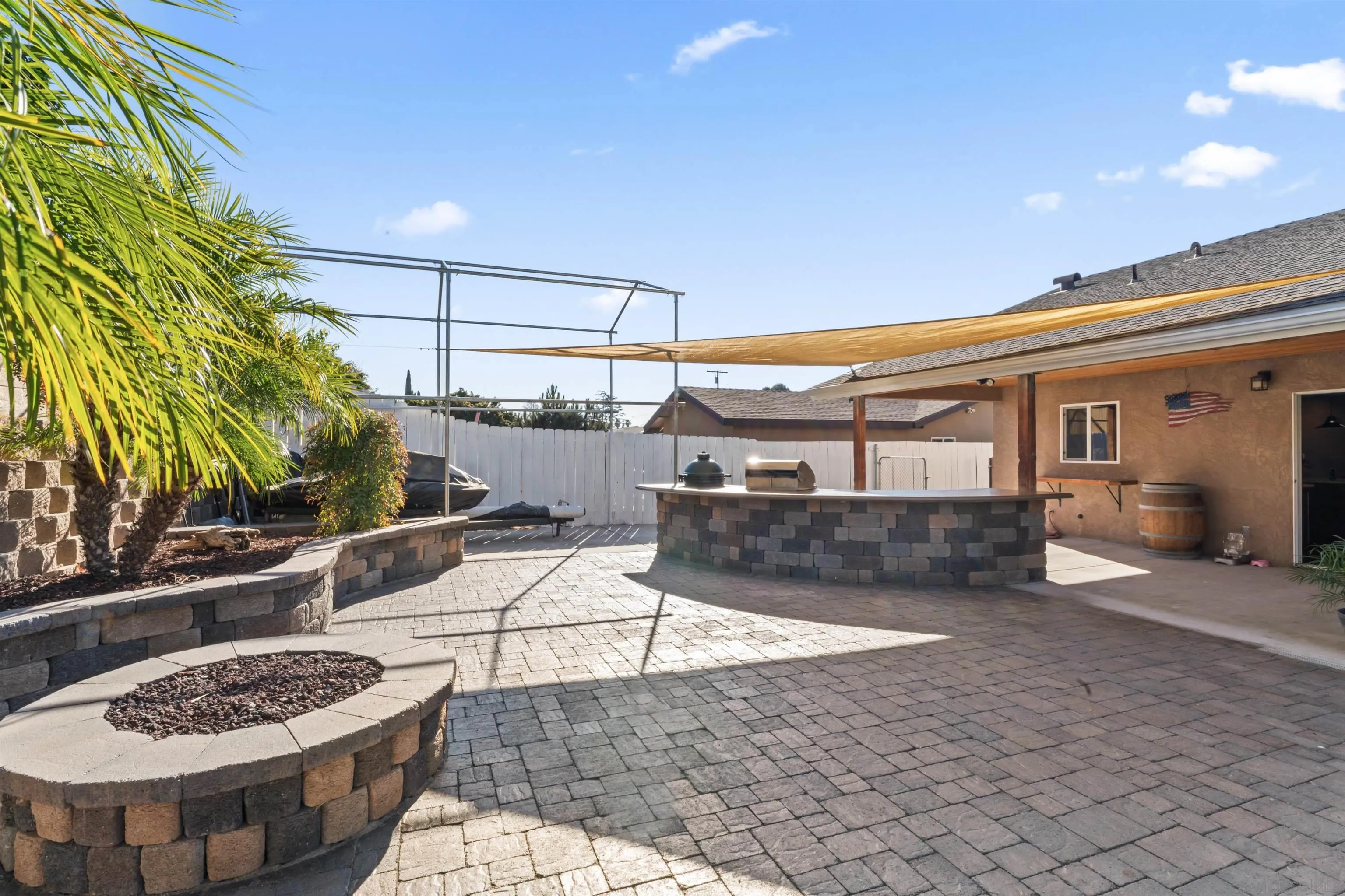 14211 Frame Road Poway, CA 92064 - Photo 8 of 11 a view of a dinning table and chair in the patio
