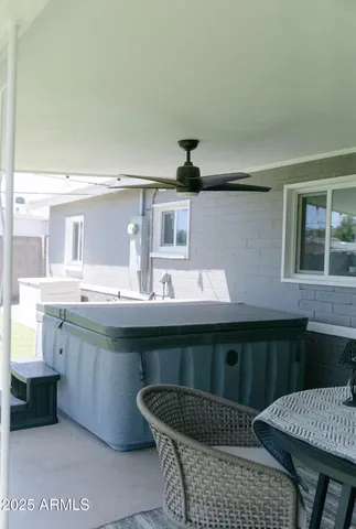 a kitchen with a table and chairs in it