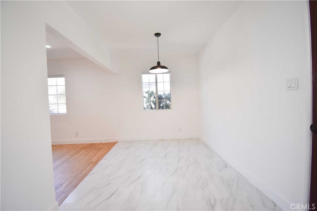 1570 North Verdugo Road, Unit B Glendale, CA 91208 - Photo 5 of 12 an empty room with windows