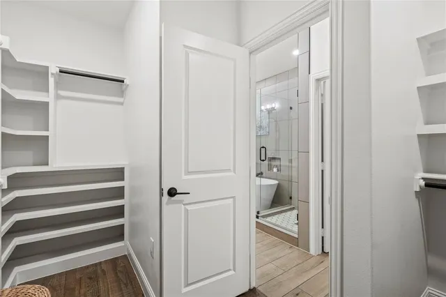 a view of an empty walk in closet