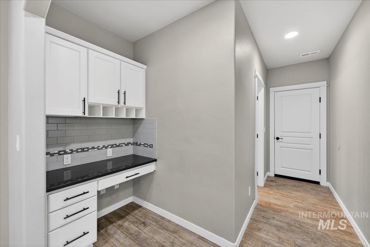 12200 West Oneida Street Boise, ID 83709 - Photo 26 of 35 Hall featuring light wood-style floors and recessed lighting
