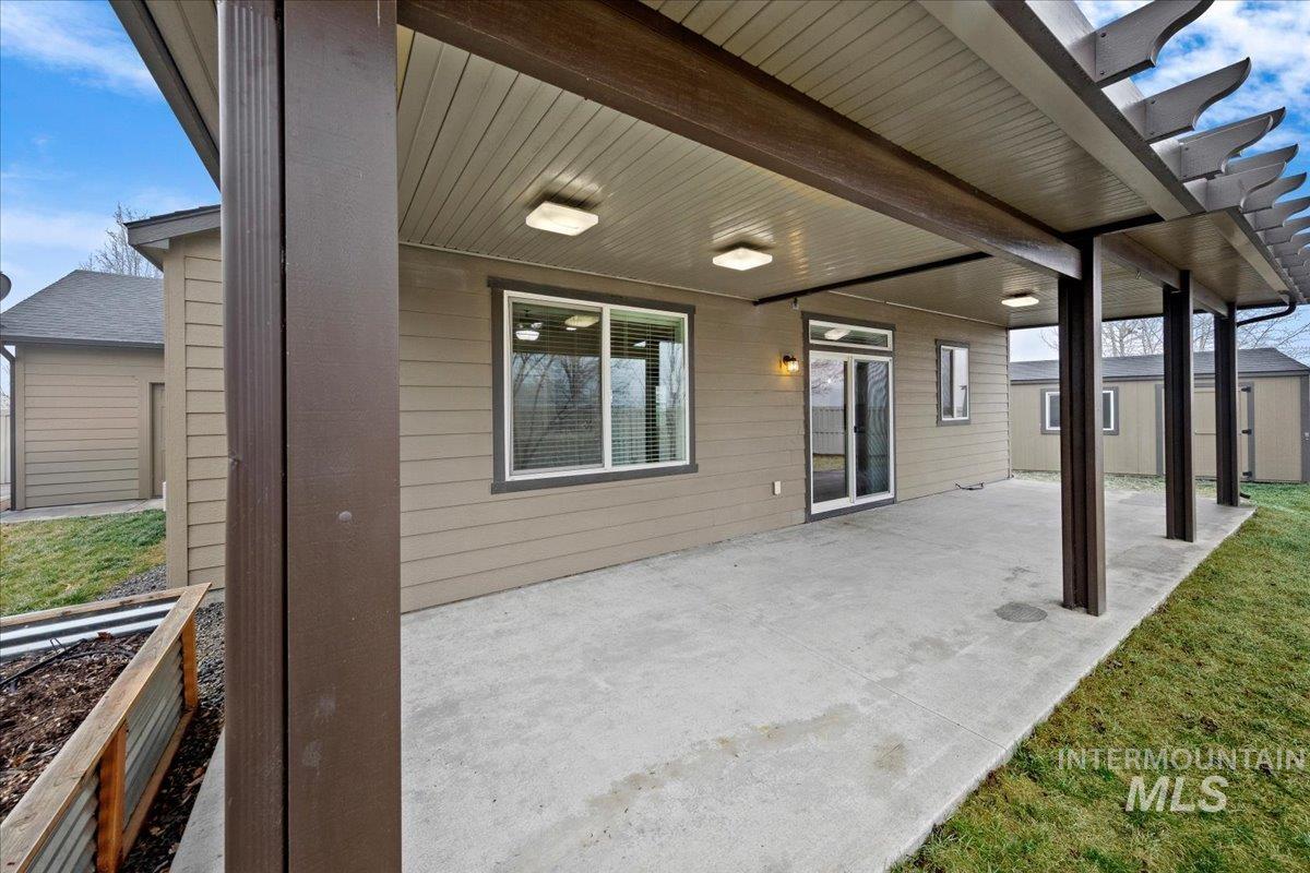 12200 West Oneida Street Boise, ID 83709 - Photo 28 of 35 View of patio with an outdoor structure