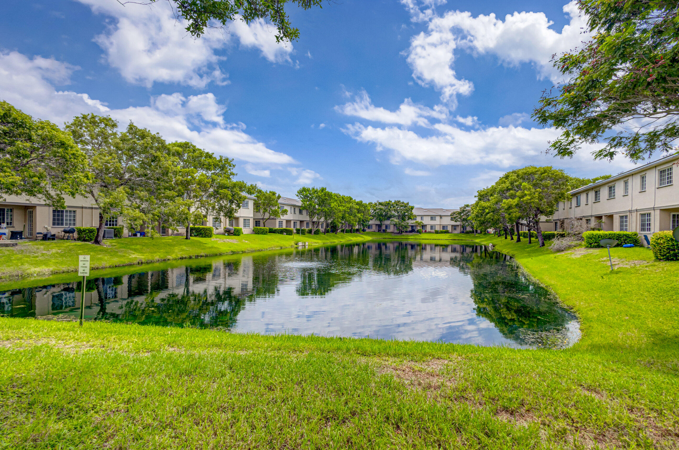 2025 Island Drive Riviera Beach, FL 33404 - Photo 12 of 46 a view of a lake with a building in the background