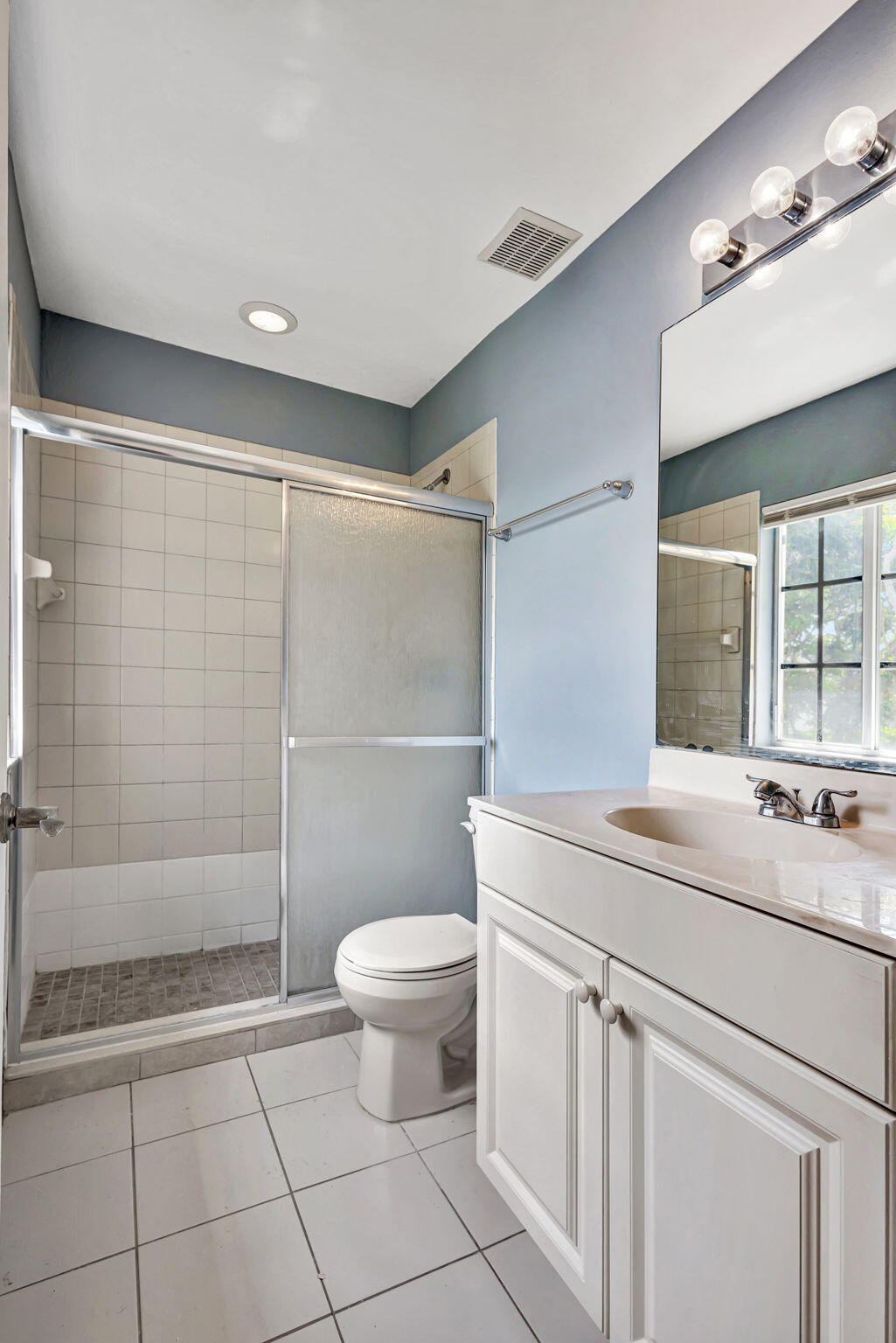 2025 Island Drive Riviera Beach, FL 33404 - Photo 26 of 46 a bathroom with a sink toilet and shower