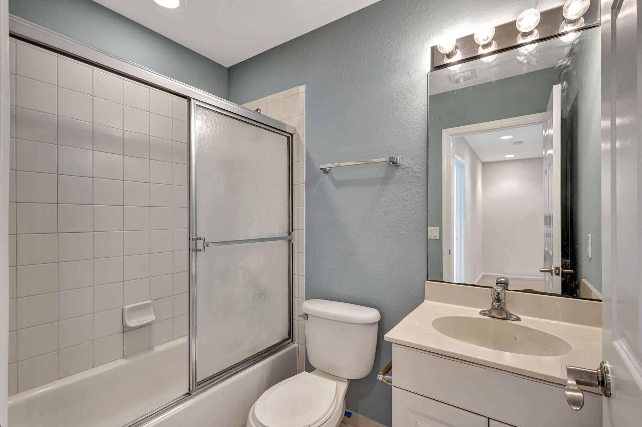 2025 Island Drive Riviera Beach, FL 33404 - Photo 29 of 46 a bathroom with a sink toilet and shower