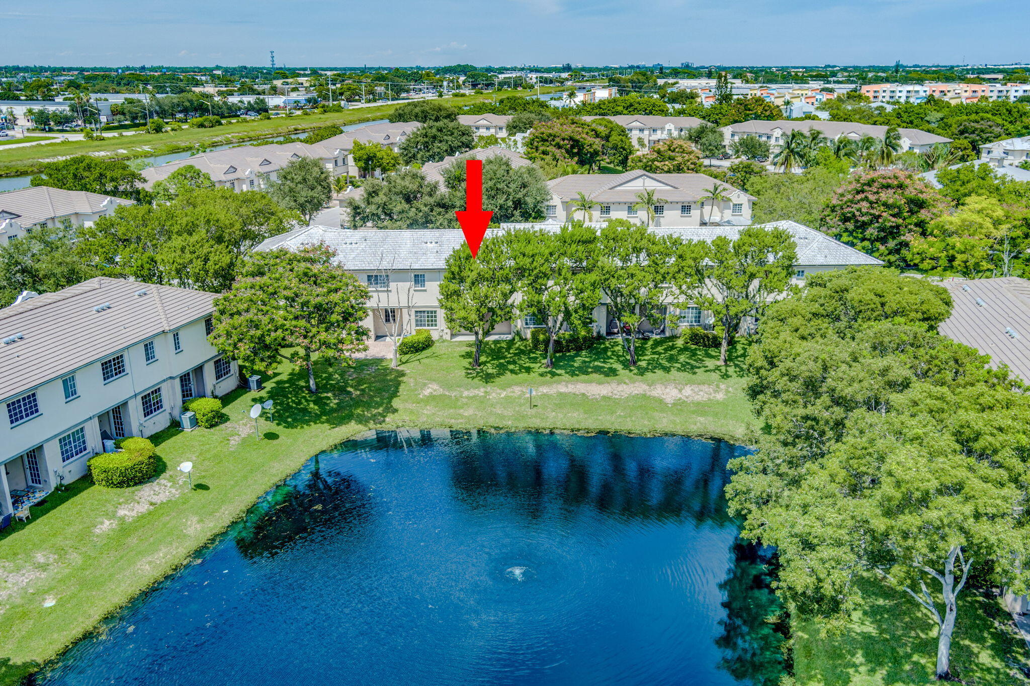 2025 Island Drive Riviera Beach, FL 33404 - Photo 3 of 46 an aerial view of a houses with outdoor space and a lake view