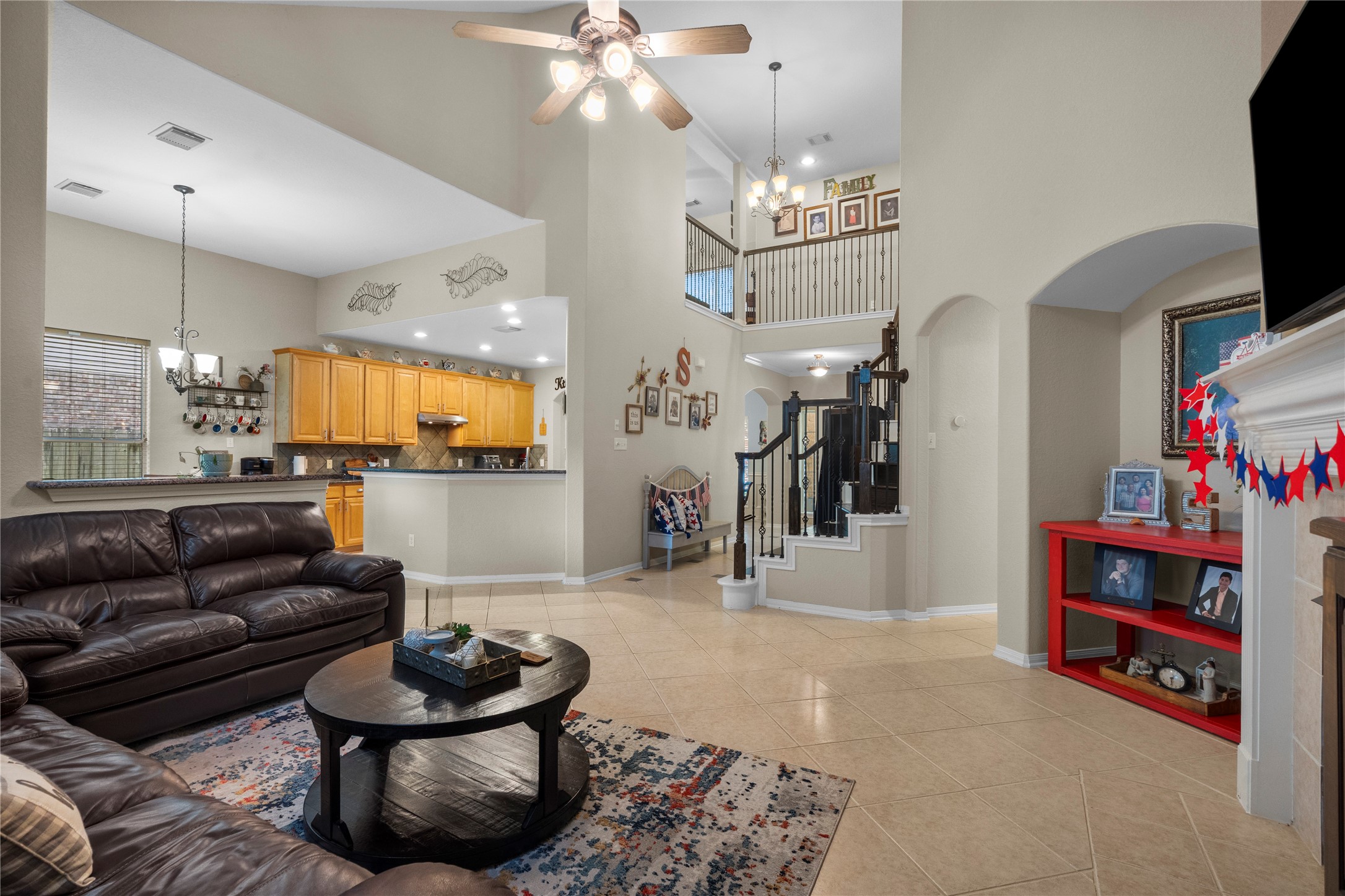 1011 Elm Pointe League City, TX 77573 - Photo 11 of 44 a living room with furniture and a flat screen tv